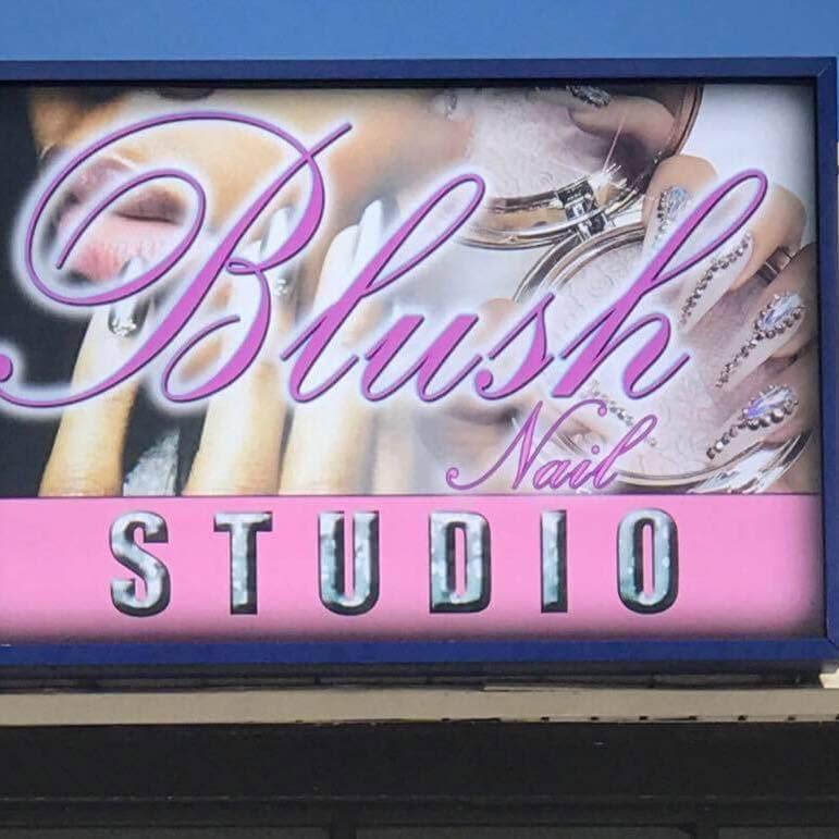The Blush Nail Studio storefront sign